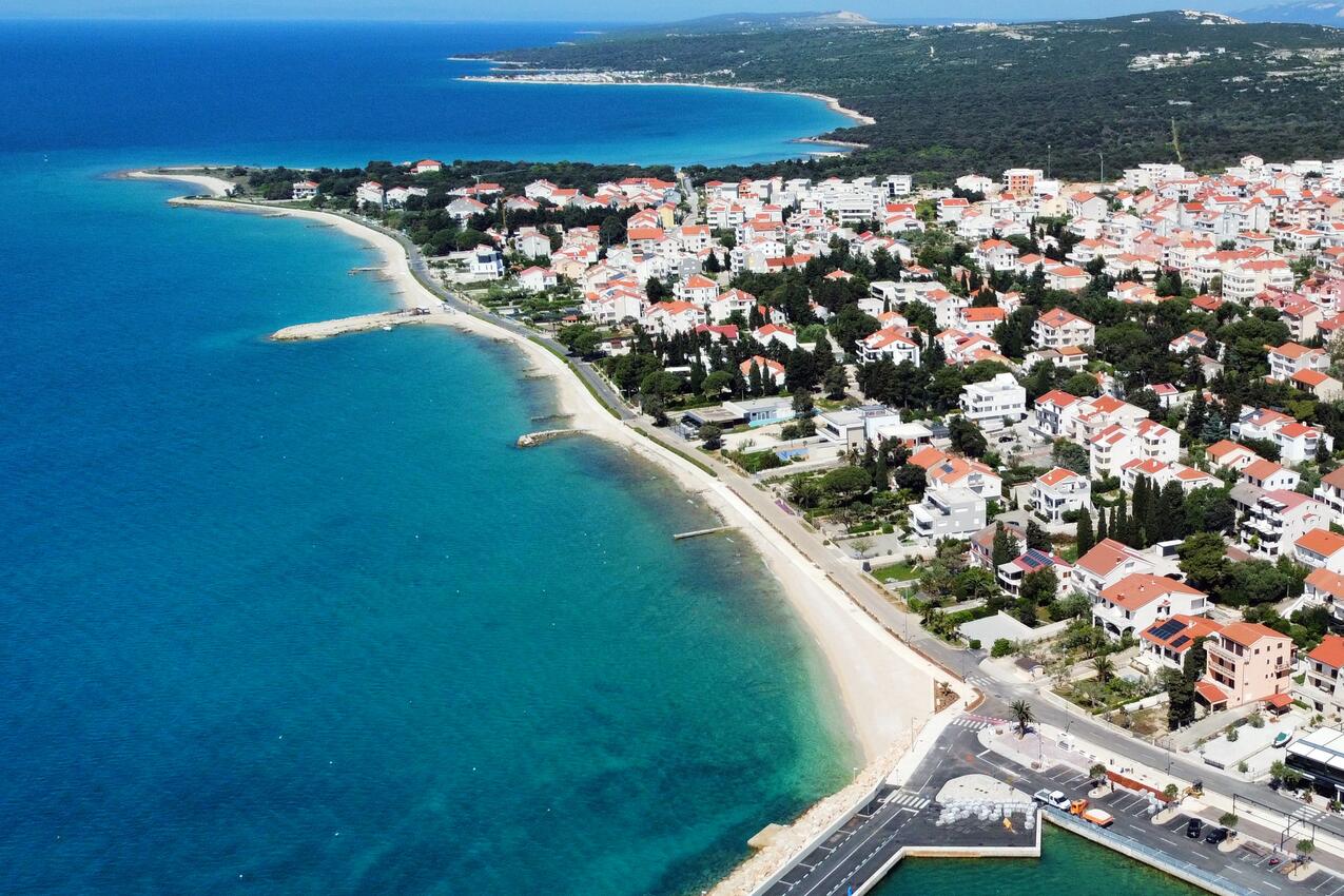 Nearest beach - Apartments and rooms with parking space Novalja, Pag