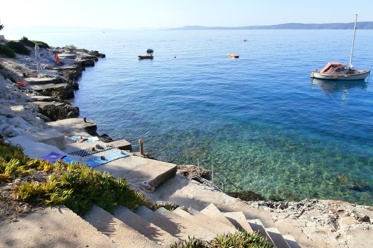 Nearest beach - Seaside apartments with a swimming pool Rastići, Čiovo