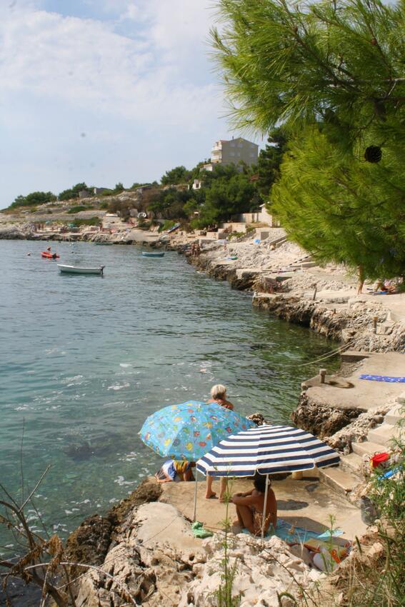 Nearest beach - Seaside apartments with a swimming pool Rastići, Čiovo