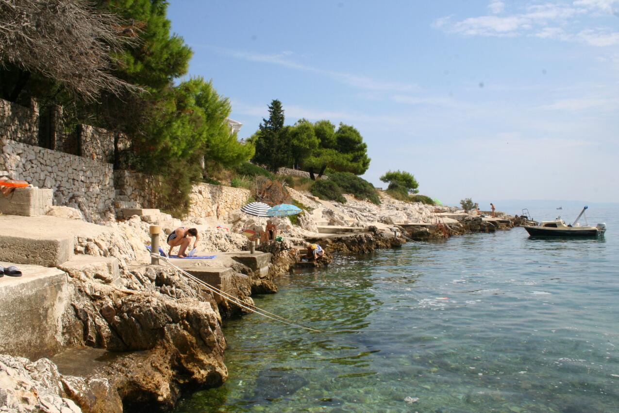 Nearest beach - Seaside apartments with a swimming pool Rastići, Čiovo
