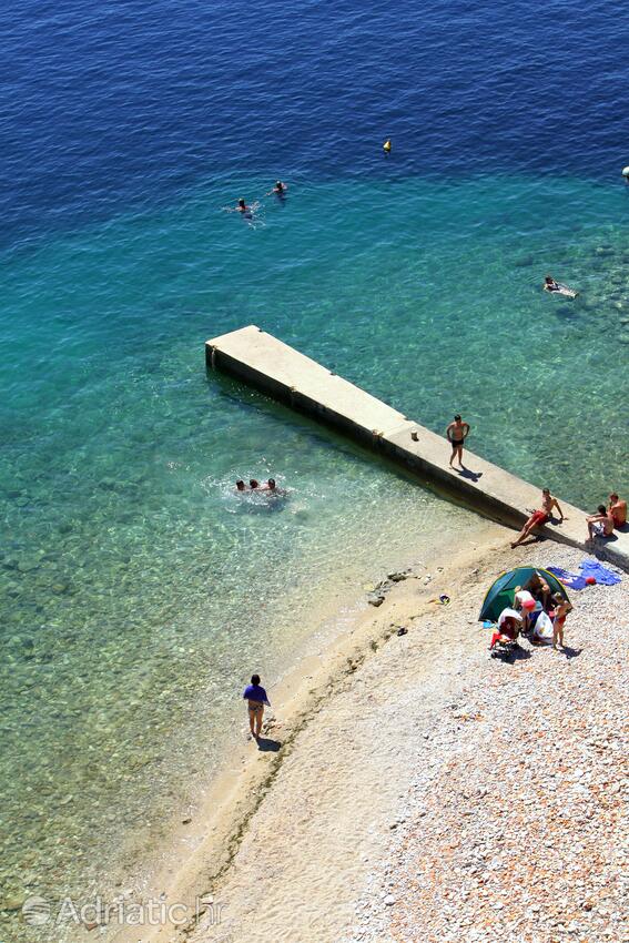 Nearest beach - Apartments with a parking space Palit, Rab