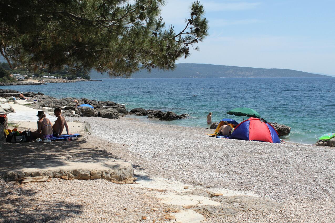Nearest beach - Apartments with parking space Krk