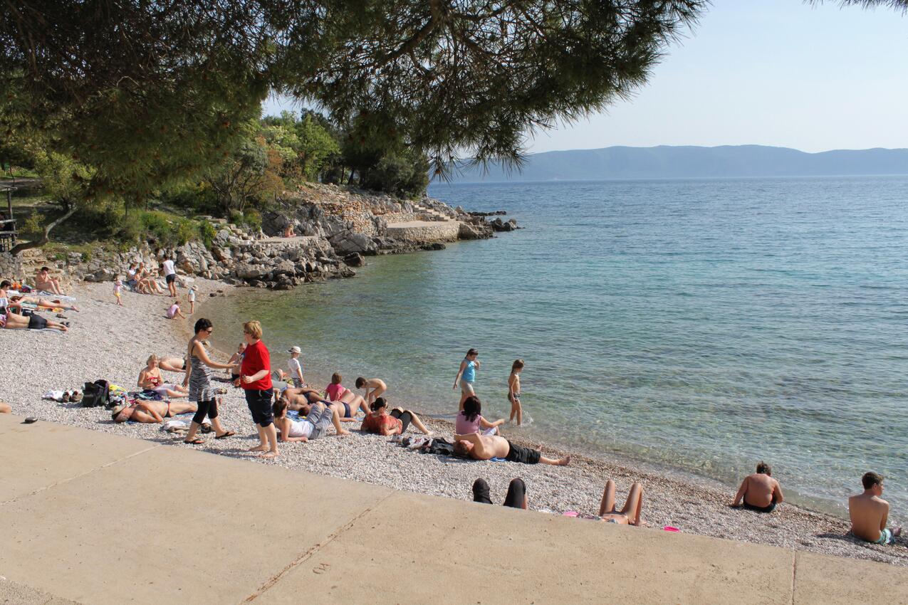 Nearest beach - Apartments with parking spaces Pinezići, Krk