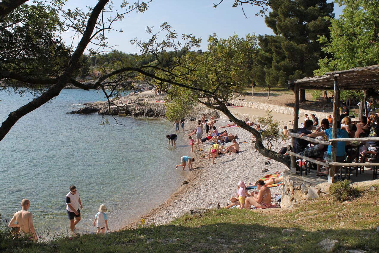 Nearest beach - Apartments with parking spaces Pinezići, Krk
