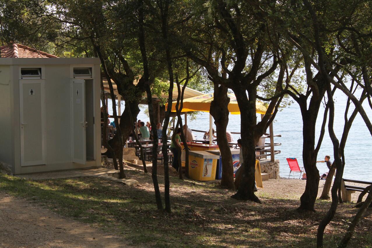 Nearest beach - Apartments with parking spaces Pinezići, Krk