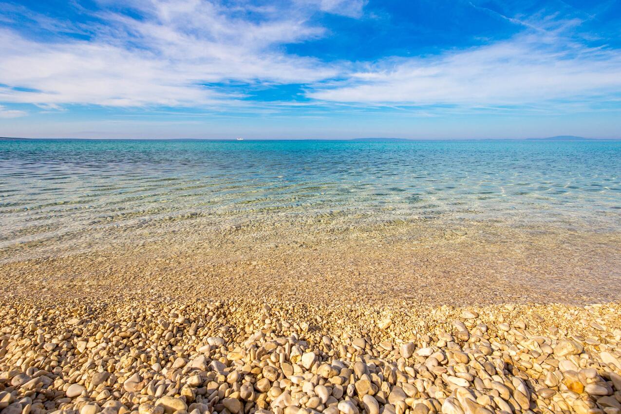 Nächster Strand - Ferienwohnungen mit Parkplatz Novalja, Pag