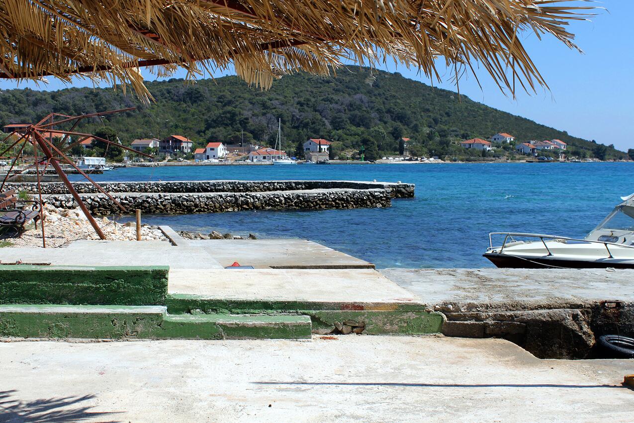 Najbliža plaža - Apartmani uz more Brgulje, Molat
