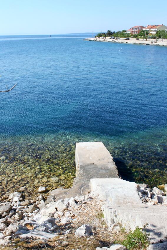 Nearest beach - Apartments by the sea Lun, Pag