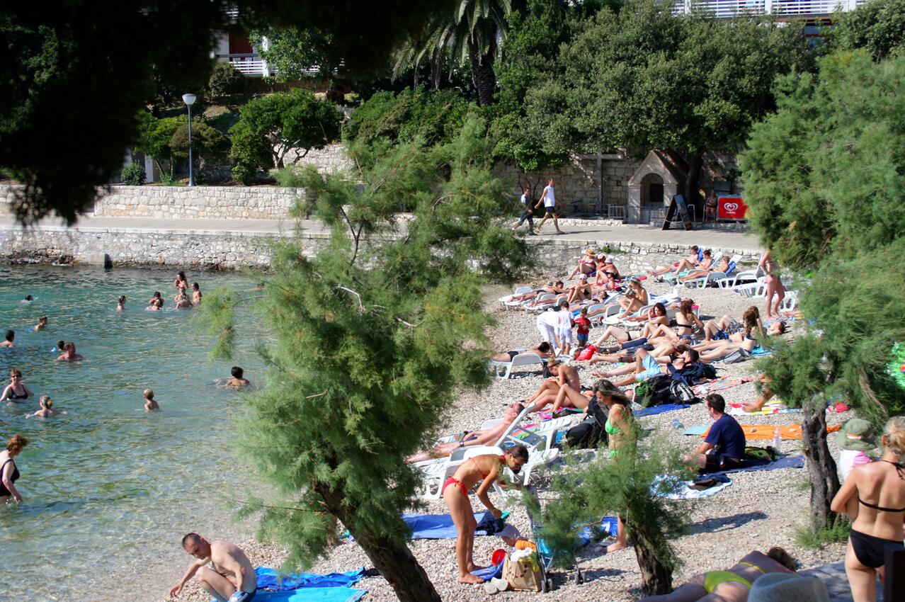 Nearest beach - Apartments and rooms with parking space Hvar