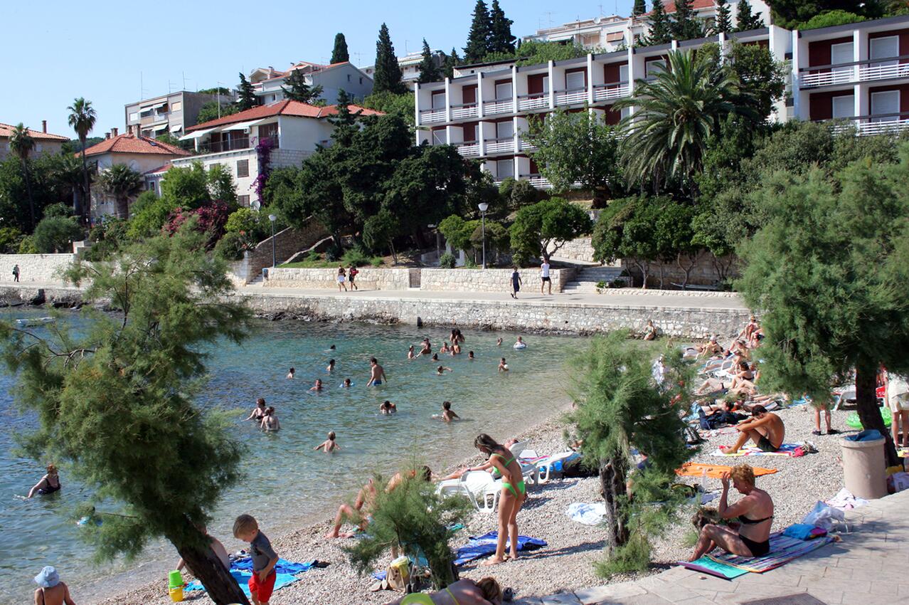 Nearest beach - Apartments and rooms with parking space Hvar