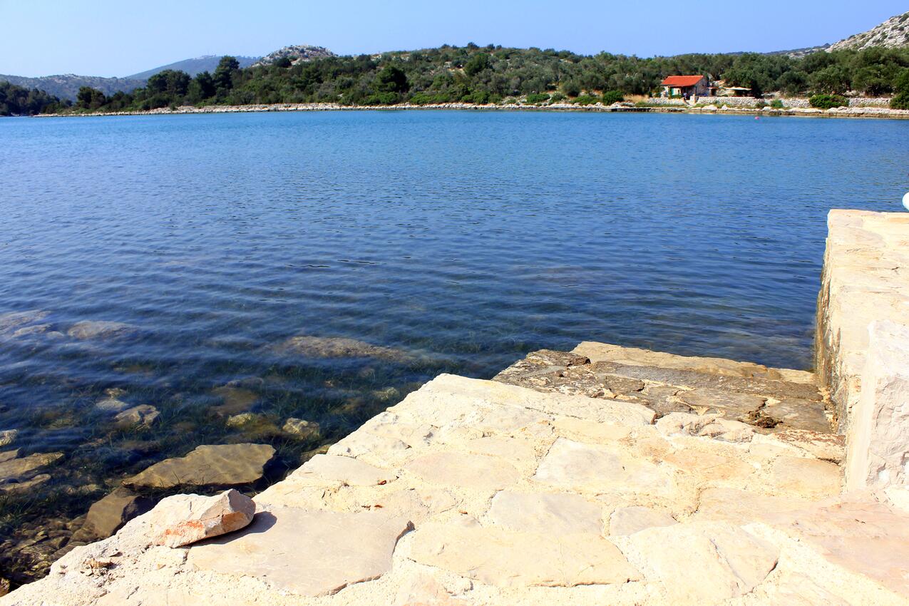 Nearest beach - Seaside secluded apartments Cove Magrovica - Telašćica, Dugi otok