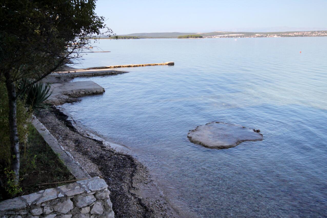 Nearest beach - Apartments with parking spaces Tkon, Pašman