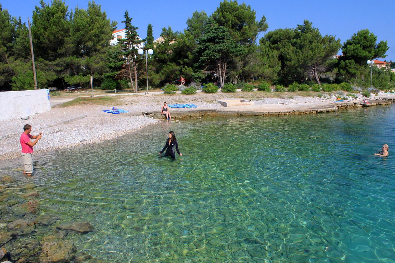 Nearest beach - Apartments with parking spaces Ugljan
