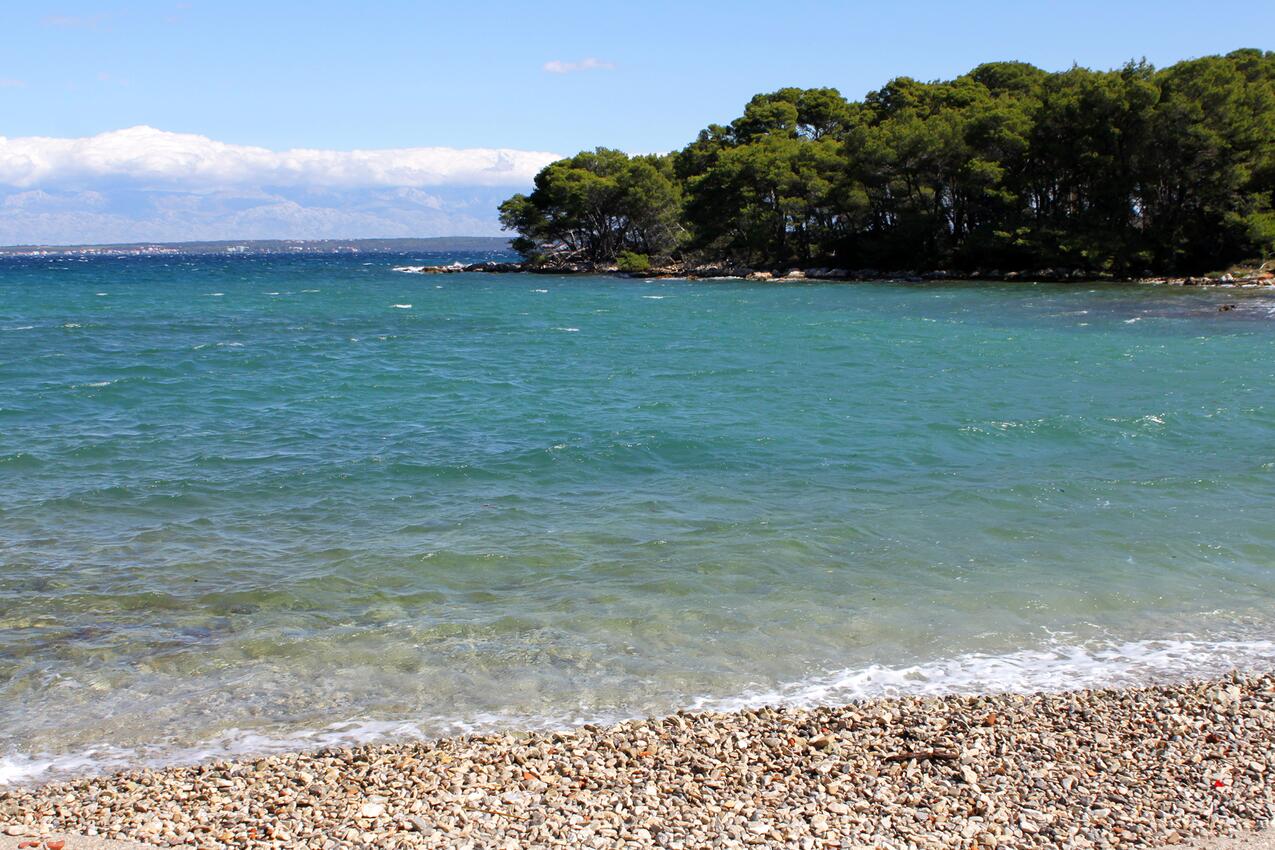 Nearest beach - Apartments with parking spaces Ugljan