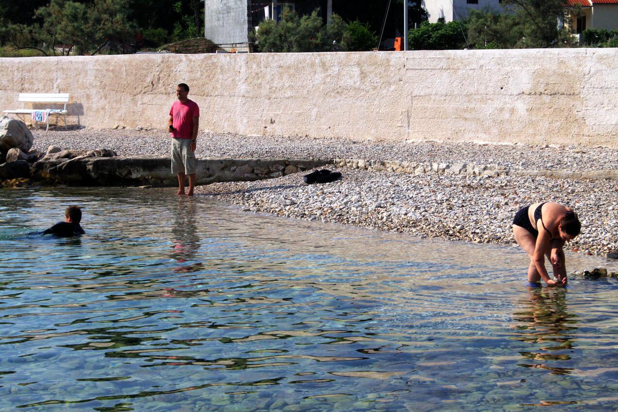 Nearest beach - Apartments with parking spaces Ugljan