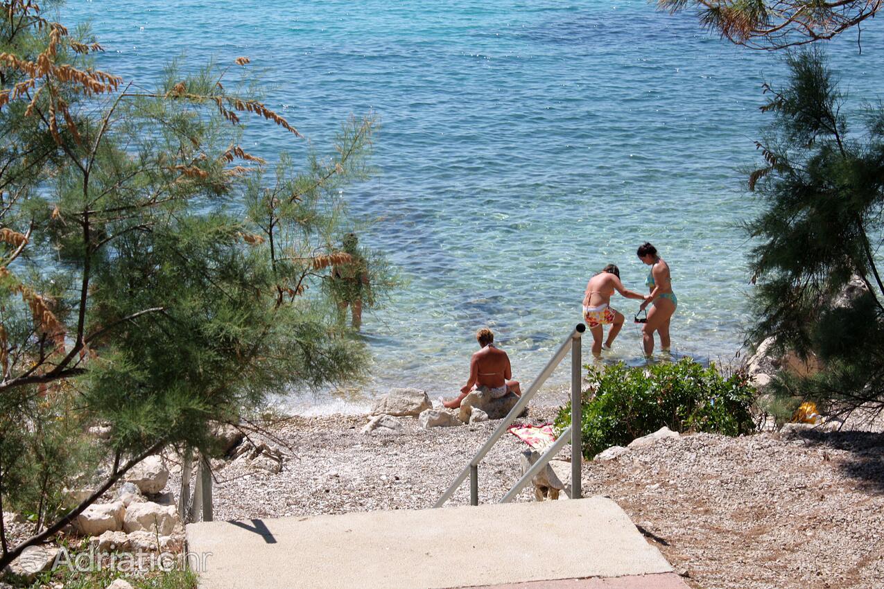 Nearest beach - Apartments with a parking space Suha Punta, Rab