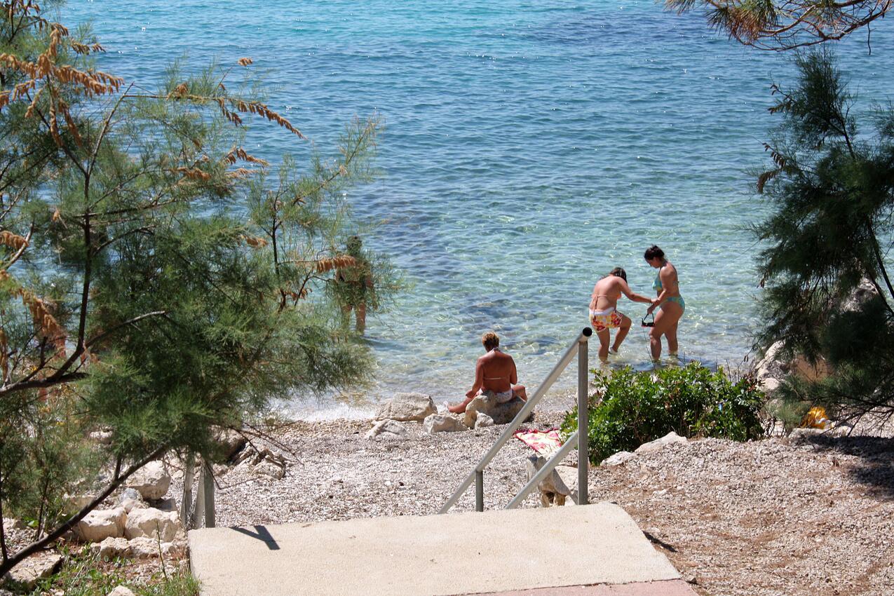 Nearest beach - Apartments with parking spaces Suha Punta, Rab