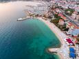 La spiaggia più vicina Spiaggia Strožanac a Podstrana, Split.