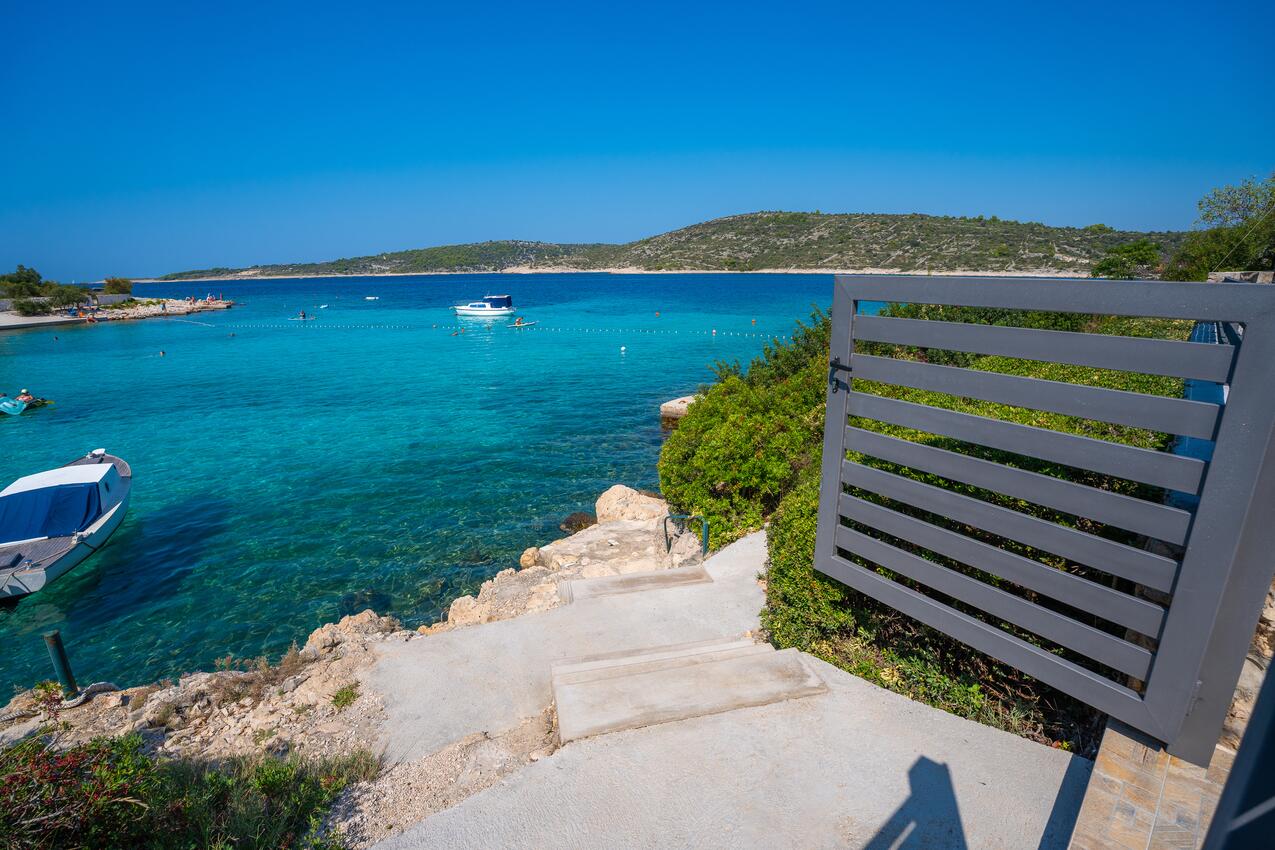 La spiaggia più vicina - Casa accanto al mare per famiglia con bambini Kanica, Rogosnizza - Rogoznica