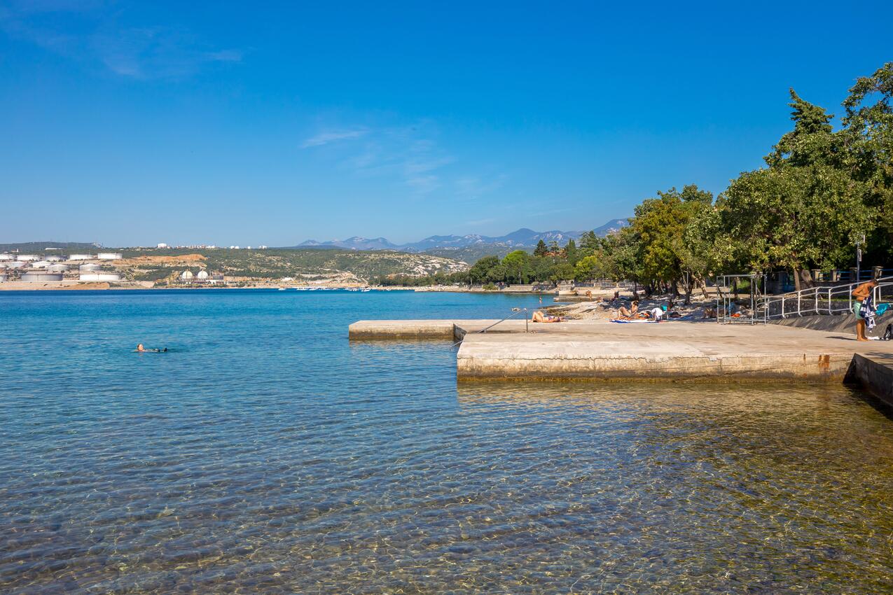 Nearest beach - Apartments and rooms with parking space Kraljevica