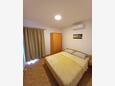 Kabli, Bedroom 2 in the apartment, air condition available and WiFi.