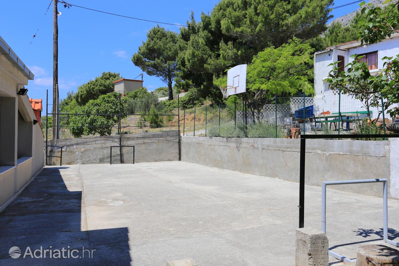 Giardino - Appartamenti accanto al mare Marussici - Marušići, Almissa - Omiš