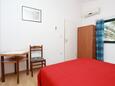 Seget Vranjica, Bedroom in the apartment, air condition available and WiFi.