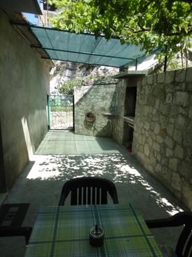 Apartment with terrace Omiš, Central Dalmatia