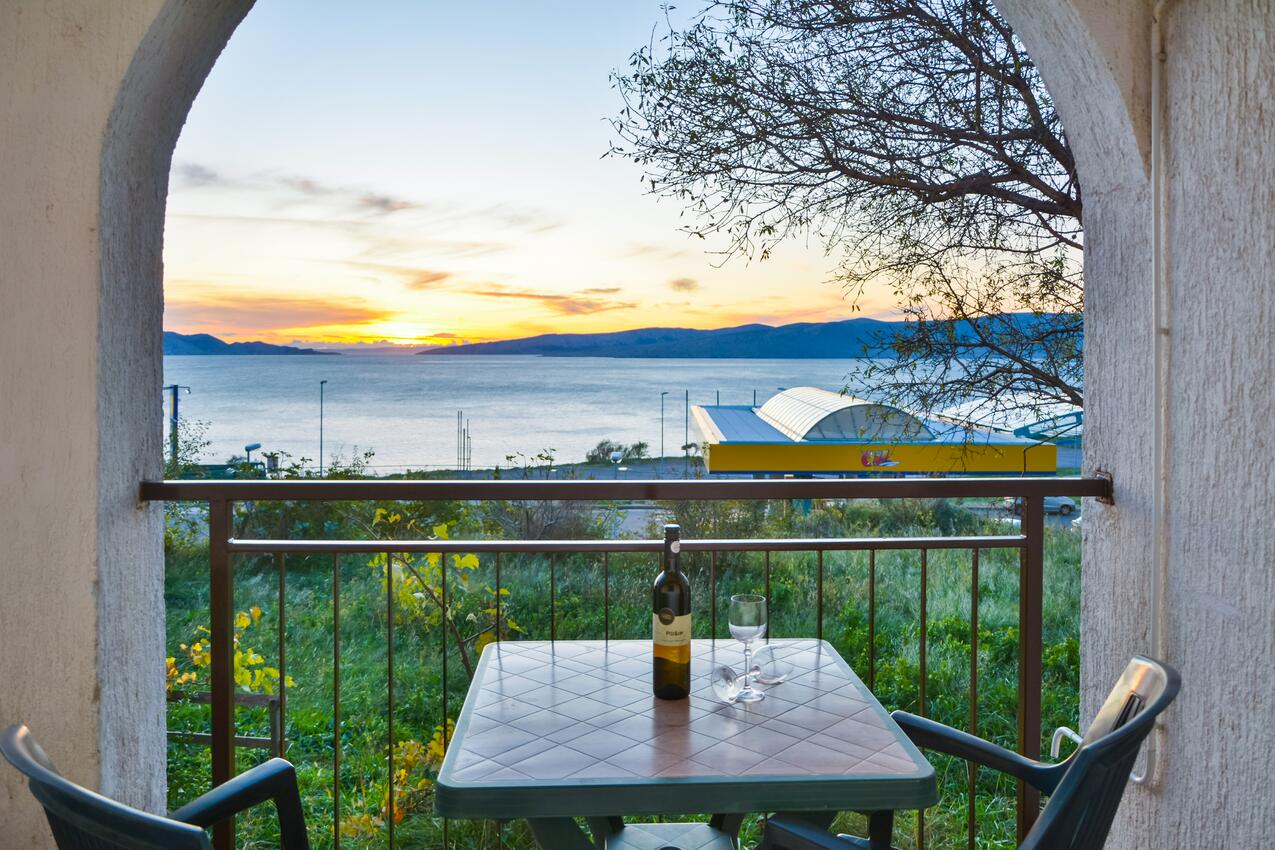 Apartments with parking space Senj - 11520