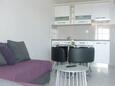 Saplunara, Living room in the apartment, air condition available, (pet friendly) and WiFi.