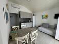 Sabunike, Dining room in the apartment, air condition available, (pet friendly) and WiFi.