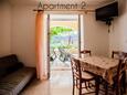 Lopar, Comedor en alojamiento de tipo apartment, aire acondicionado disponible y WiFi.