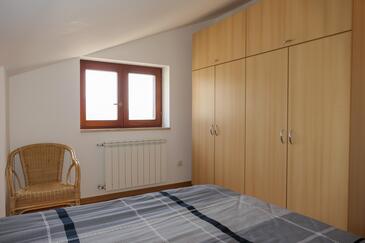 Apartments with parking space Senj - 15376