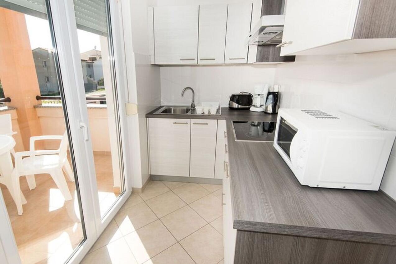 Apartmaji z bazenom za družine z otroci Vinkuran, Pula - 15736