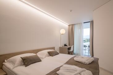 Lägenheter med pool lämpliga för familjer med barn Novalja, Pag - 15882