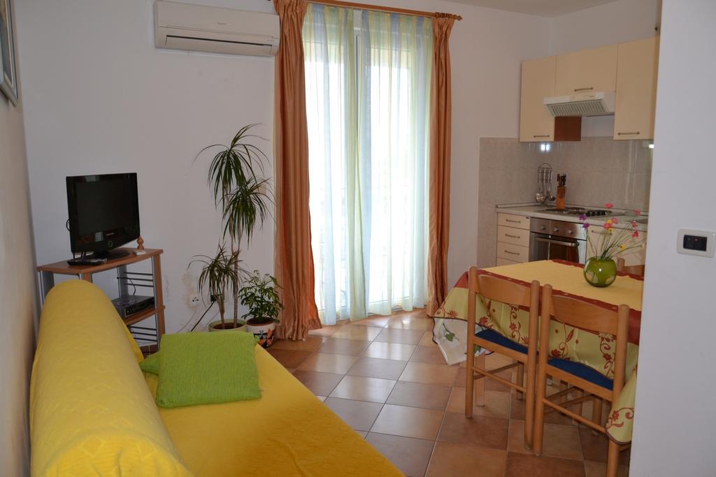 A-16509-c - Private accommodation - Family friendly apartments with a swimming pool Trogir