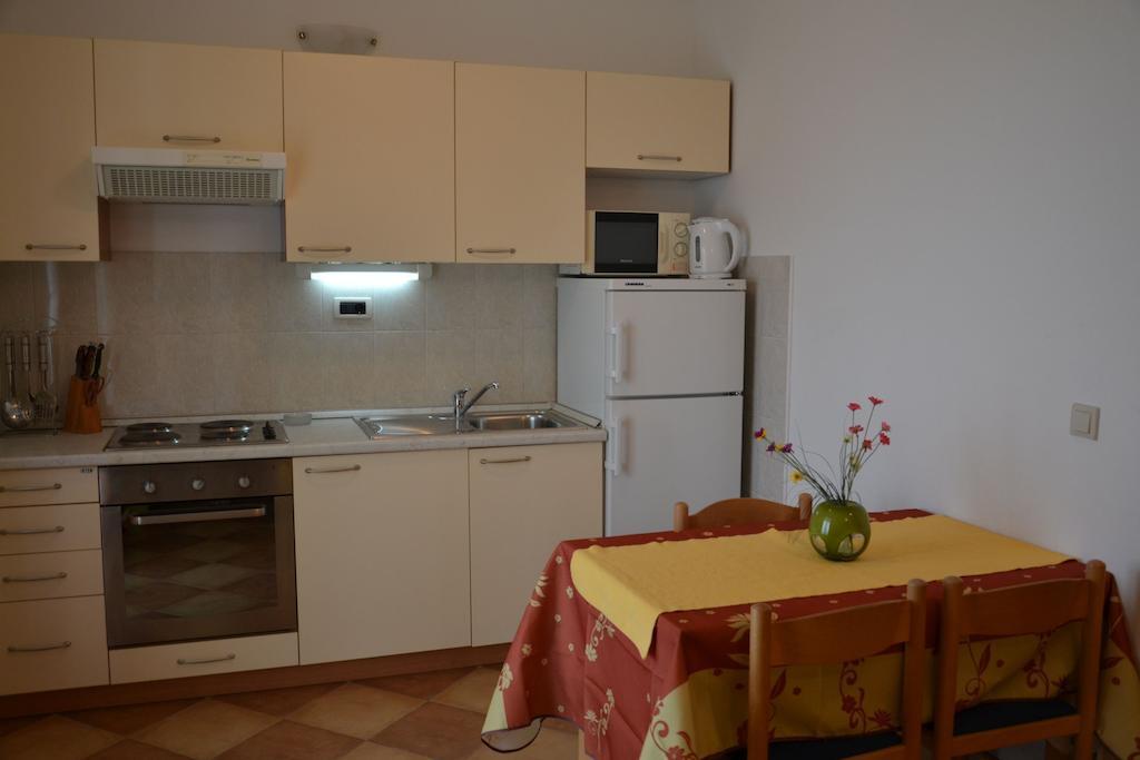 A-16509-c - Private accommodation - Family friendly apartments with a swimming pool Trogir