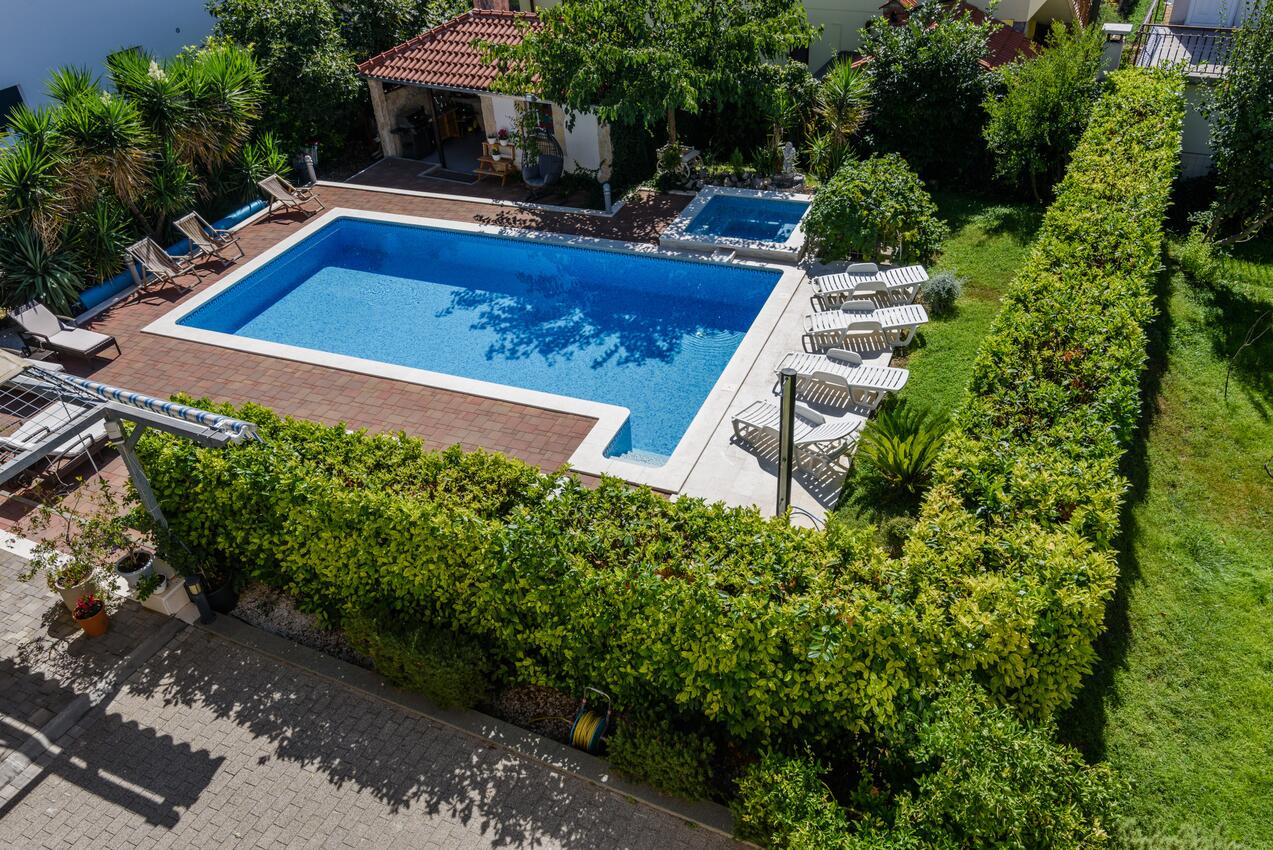 Courtyard - Family friendly apartments with a swimming pool Trogir