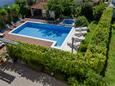 Family friendly apartments with a swimming pool Trogir - 16509