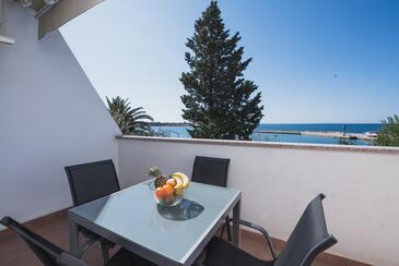 Apartmani uz more Novalja, Pag - 17214