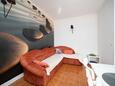 Lopar, Salon dans l’hébergement en type apartment, climatisation disponible, animaux acceptés et WiFi.