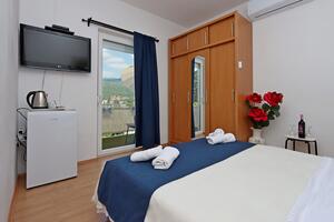 Rooms with a parking space Novi Vinodolski - 21509