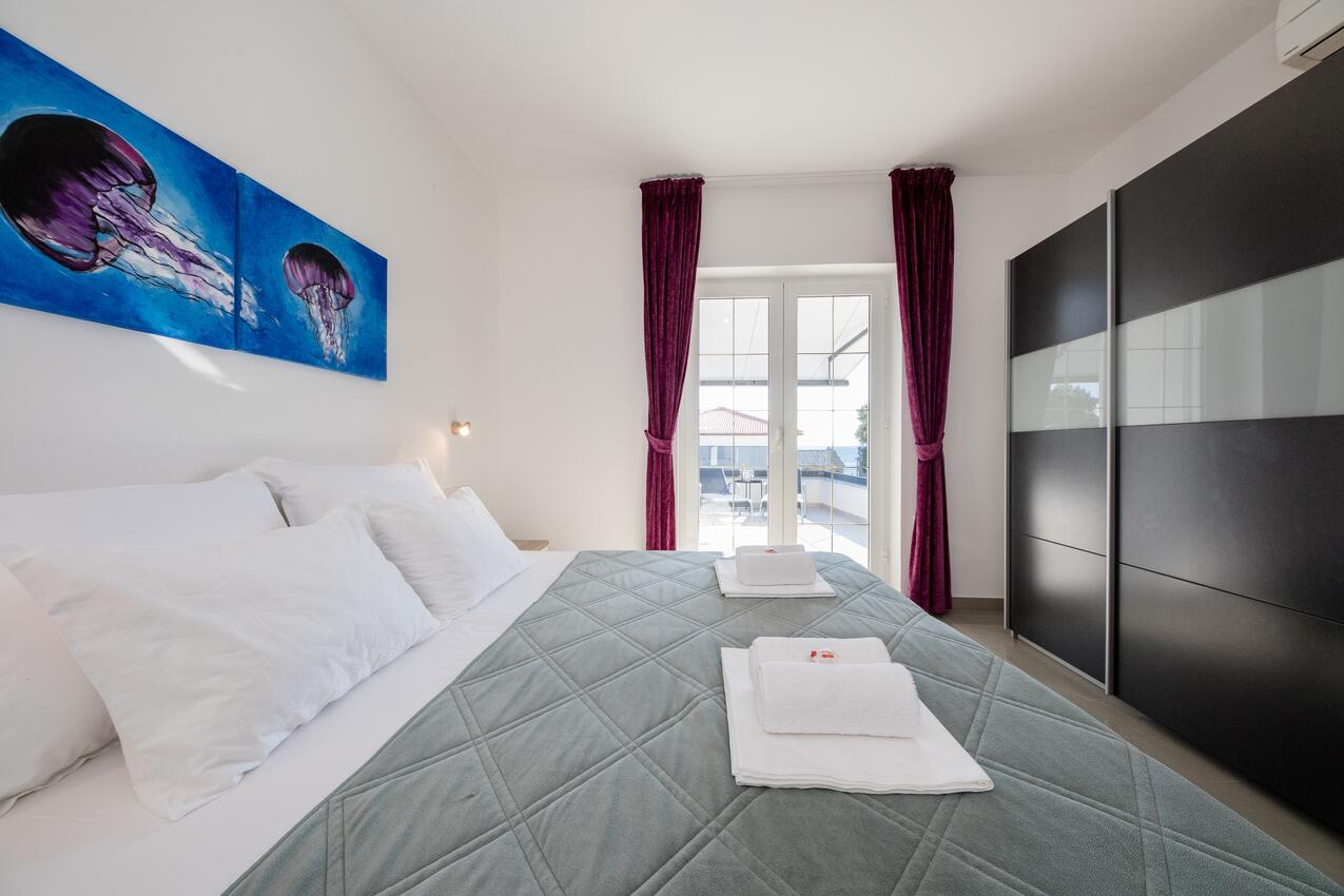 Apartments by the sea Banjol, Rab - 21635