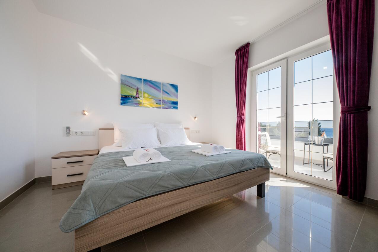 Apartments by the sea Banjol, Rab - 21635