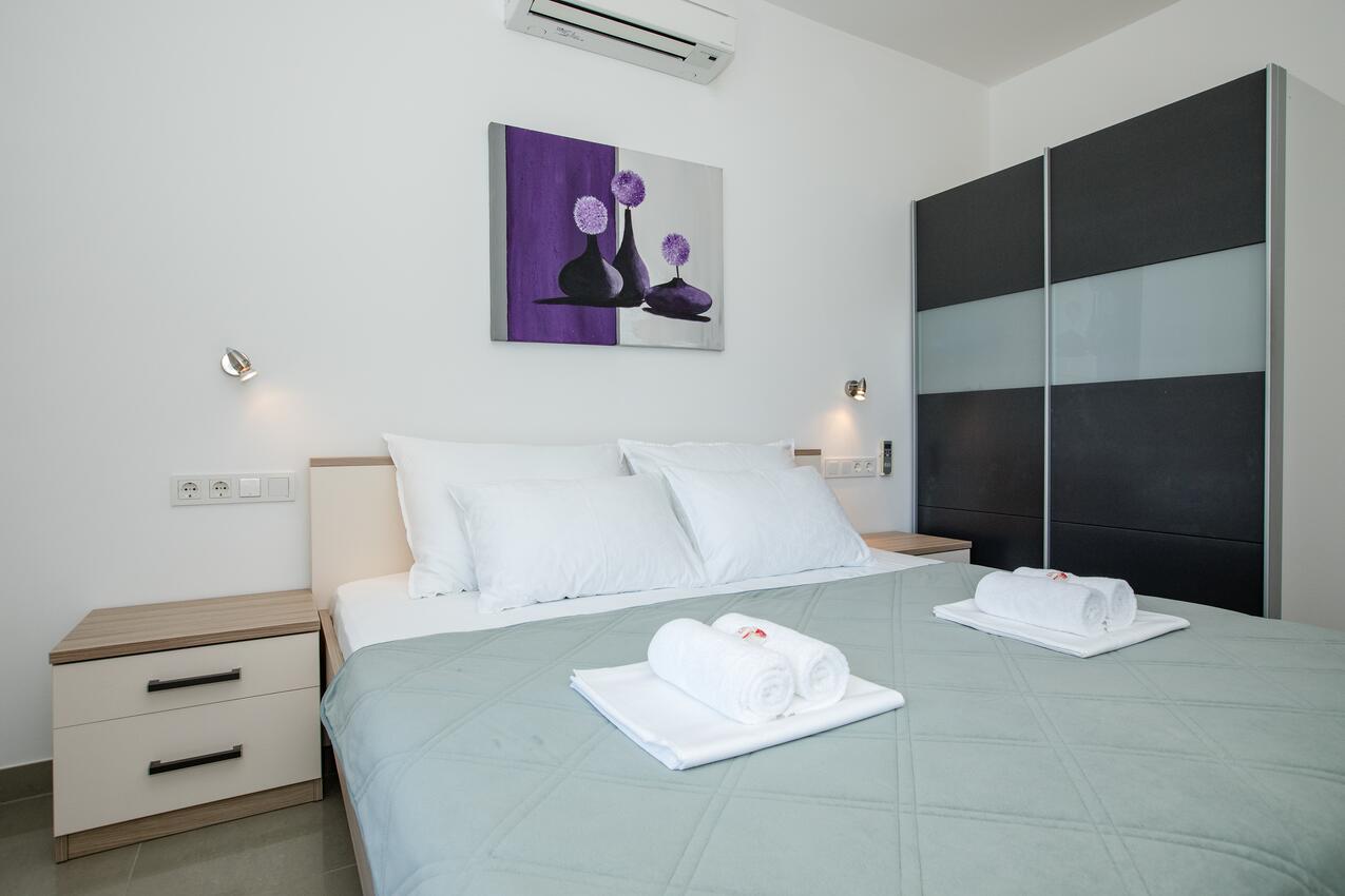 Apartments by the sea Banjol, Rab - 21635