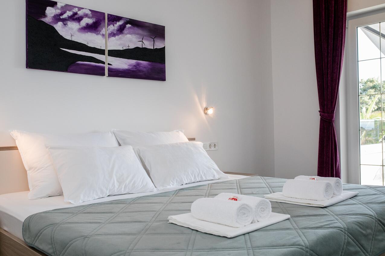 Apartments by the sea Banjol, Rab - 21635