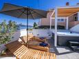 Mali Iž, Terrasse 1 dans l’hébergement en type apartment, avec la vue sur la mer et WiFi.