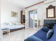 Supetar, Woonkamer in accommodatietype apartment, airconditioning beschikbaar en WiFi.
