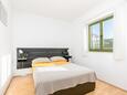 Kaštel Novi, Dormitorio 1 en alojamiento de tipo apartment, se admiten mascotas y WiFi.