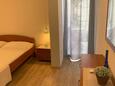 Camera da letto   Drašnice, Camera da letto   nell'alloggi del tipo apartment, condizionatore disponibile e WiFi.